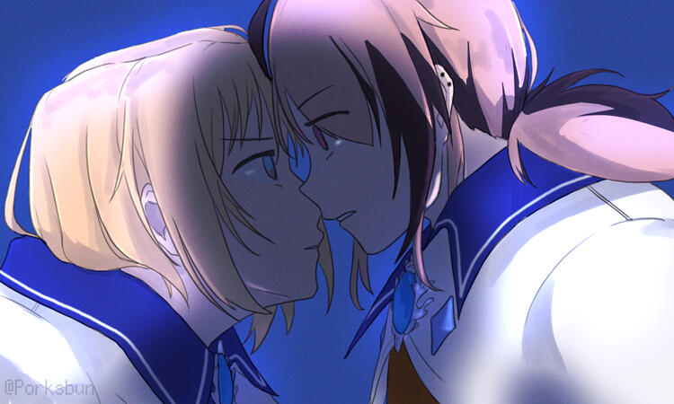 Image of two girls wearing cloaks facing each other, their noses overlapping.